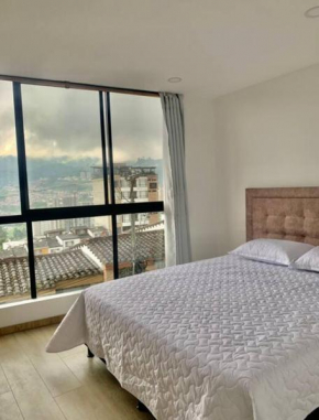 Cama Queen, Vista a las Montañas